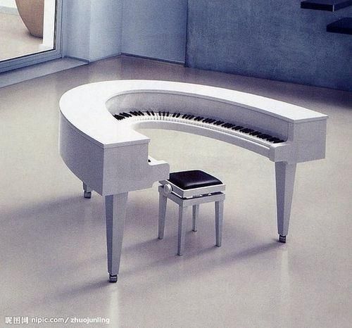 Round pianos and keyboards seem to be a bit of a trend and this one is perfect for anyone who wants to be inside of one. Slide on into the loop and spin around as you play.